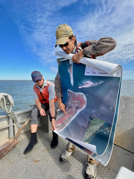 Hein displays a map of Virginia's barrier islands to students during VIMS' annual orientation field trip to the Eastern Shore. © L. Patrick/VIMS.