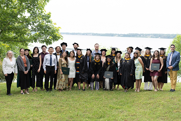 VIMS 2023 graduates celebrate overlooking the water. Photo Credit: Miguel Montalvo